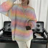 Suéter suelto de punto con rayas en degradado pastel azul y rosa